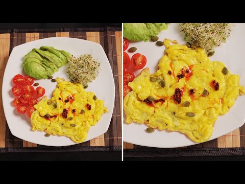 Perfect scrambled eggs with Avocado, cherry tomatoes & Alfalfa.