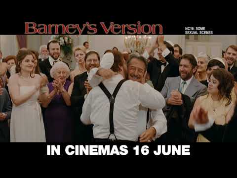 International trailer still: wedding reception with guests, bandstand visible in background