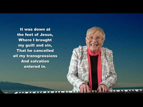 IT WAS DOWN AT THE FEET OF JESUS