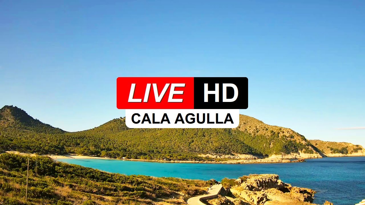 Live webcam view of Cala Agulla Beach - Elevated Panoramic View