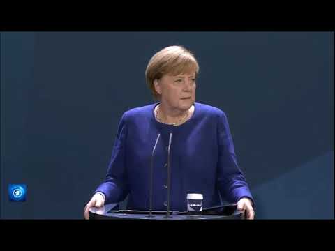 Merkel Schaut hin und her