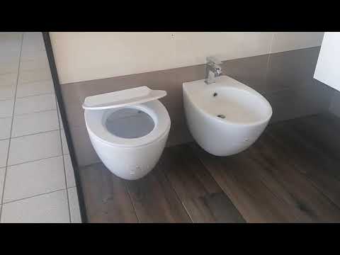 Sanitari sospesi Made in Italy - Wc + Bidet + Copri-wc Gran Mascalzone 52 x 36 cm.