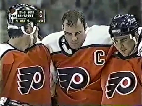 Darius Kasparaitis destroys Eric Lindros