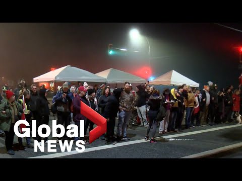 Trucker protests: Traffic moving again at BC border after 12 protesters arrested