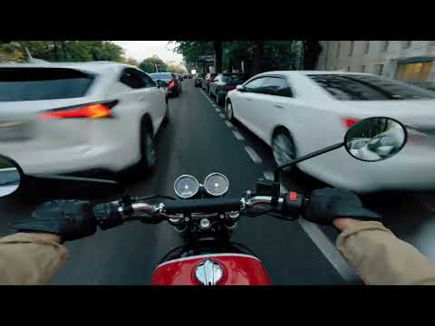 The pure sound of a Royal Enfield Interceptor 650 cruising through the streets of Almaty.