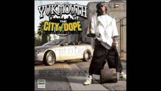 Yukmouth - gangsta , hustla , playa & a pimp it.
