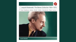 Stokowski speaks to the orchestra