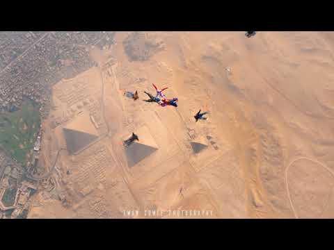 Moment Skydivers Perform First Night Jump Over Giza Pyramids
