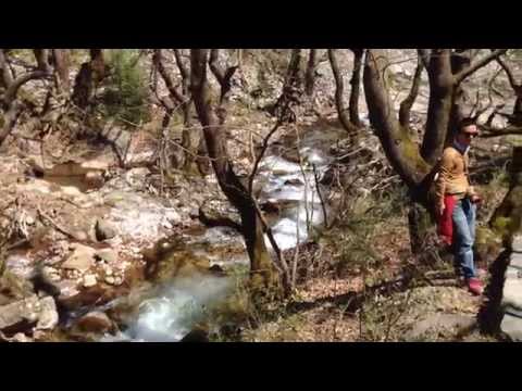 Hiking down the canyon to the waterfall in the Pindos Mountains, Central Greece