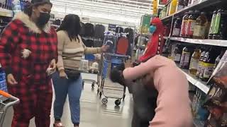 two womens fighting in supermarket (white woman vs