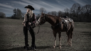 Model Brittany on location with her horses.