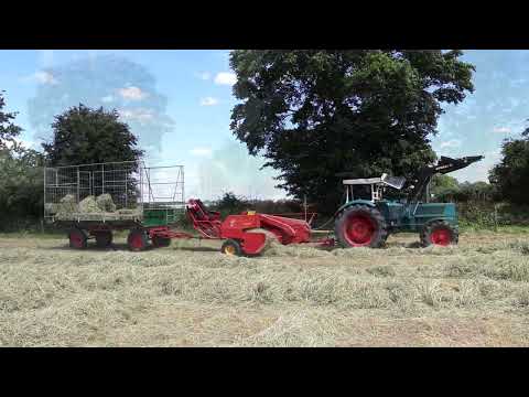 Hanomag Brillant 700 mit Welger Presse im Heu.
