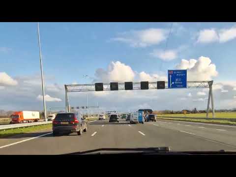 Amsterdam - s-Hertogenbosch on Dutch highway during heavy traffic. Hyperlapse.