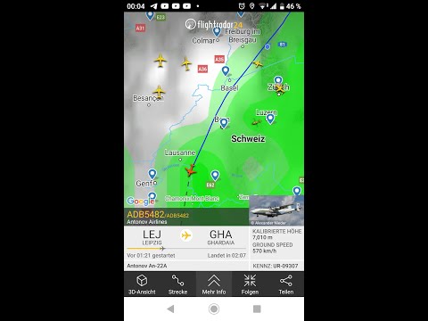 Antonov AN-22A "Antei" flying over at night.
