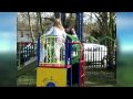 Stacey Playing On A Kids Climbing Frame