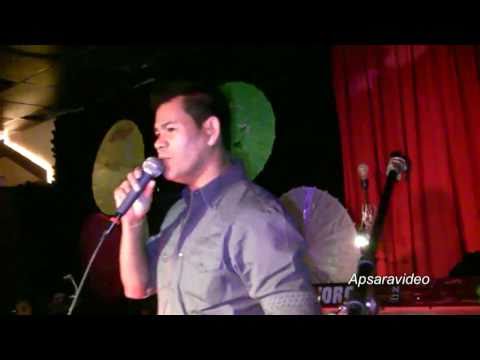 Guest singer Sam  is singing a classic Sin Sisamuot Cha Cha Cha  at Golden Villa