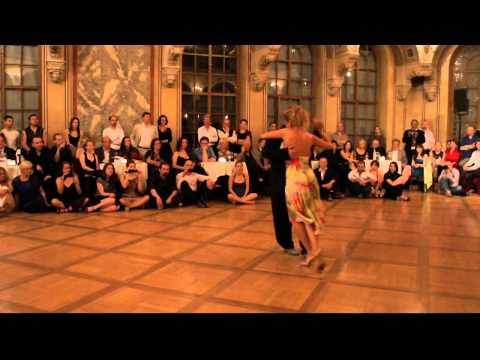  Carlos Espinoza  and  Noelia Hurtado Pitruzzella  are  dancing  to  the  milonga  "  Milonga Querida  "  by  Juan D'Arienzo  at  TangoAmadeus  in  2012
