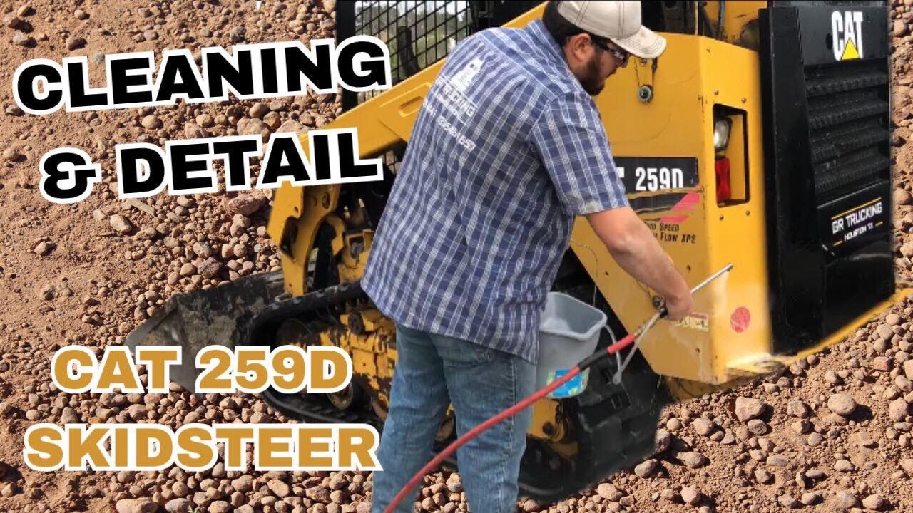 Cat 259d skidsteer detailed cleaning and removing dirt, mud from tracks
