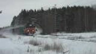 preview picture of video 'Wood freight train 4220 passing Kapala level crossing'