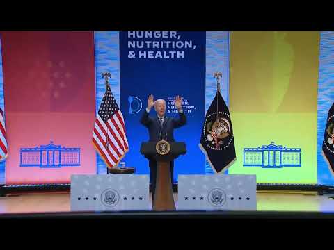 Biden Walks On Stage, Points At Random Audience Member And Yells, “Don’t Jump!”