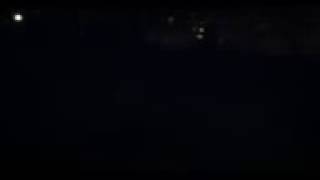 UFO spinning lights comes together or search light