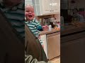 Giggling Baby Throws Head Back In Laughter