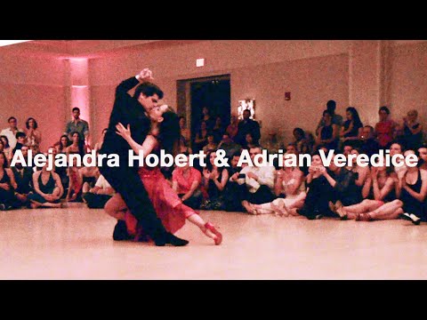  Alejandra Hobert  and  Adrian Veredice  are  dancing  to  the  tango  "  Garua  "  by  Aníbal Troilo  at  Chicago Tango Week  in  2013