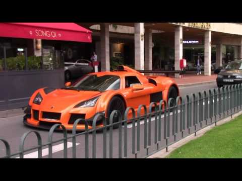 Blonde girl driving Gumpert Apollo around Monaco!