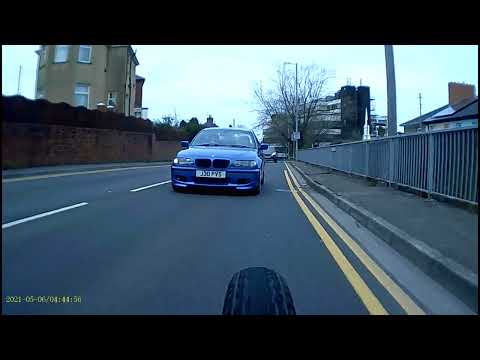 Double close pass on cyclist, police response in description.