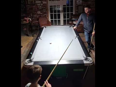 8-year-old son schools dad with an epic trick shot!