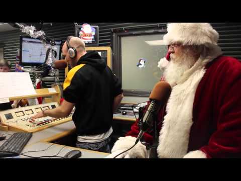 Santa Flips the Switch on Christmas Music at the KDAT Studio