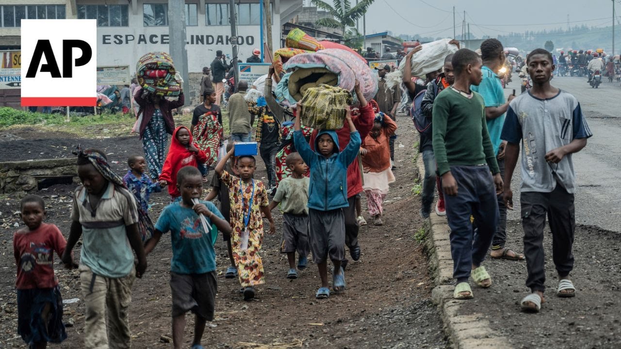 Hundreds in Goma attempt to flee towards the border with Rwanda as fighting continues
