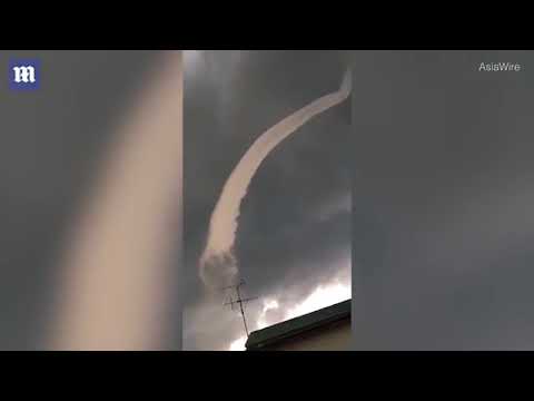 Snake cloud captured slowly evaporating into the sky