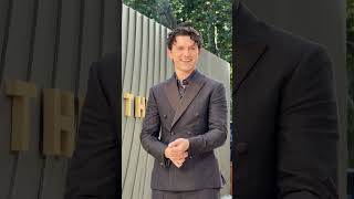 A suave Tom Holland at the World Premiere of The Odyssey.