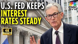 Fed leaves rates unchanged at about 3.6%, cites still-elevated inflation, solid eco growth
