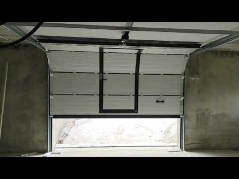 Puerta Seccional de garaje con Puerta Peatonal | PUERTAS FRESNEDA