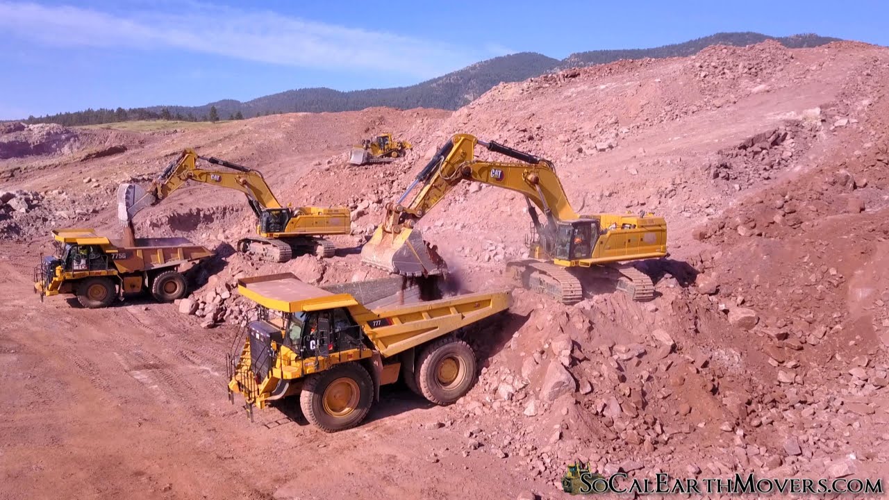 Dueling CAT 395 Excavators