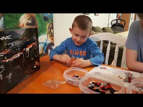 Isaiah and Samuel building Lego technic set 42139