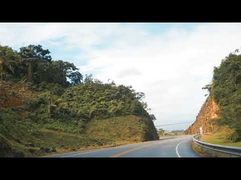 highway in the middle of a mountain range 4633 4k