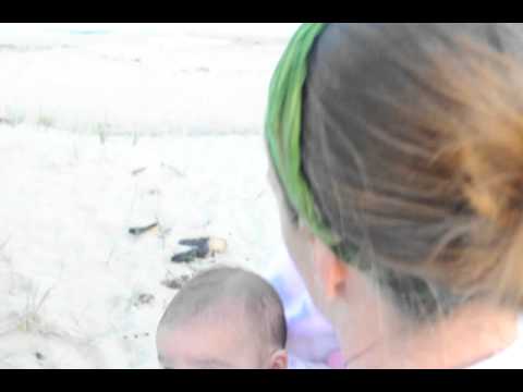 Kyra's first time on the beach!