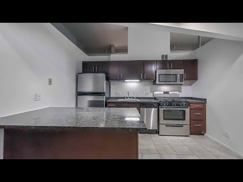 An Old Town 2-bedroom loft #G303 at Cobbler Square on Wells Street An Old Town 2-bedroom loft #G303 at Cobbler Square on Wells Street