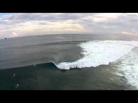 Aerial overview of lineup and waves at Batcaves