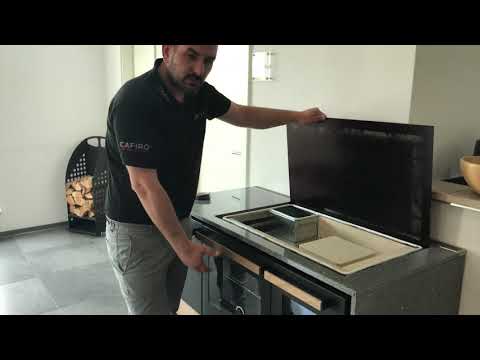 How does a wooden kitchen stove with a ceramic hob work?