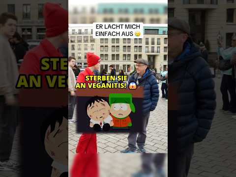 Sympathischer Mann kichert wegen Hundefleisch