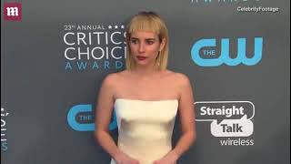Emma Roberts arrives at Critics' Choice with Evan Peters