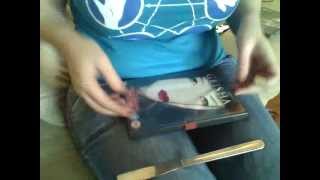 How to remove the Red Dvd Security Tag with a Butter Knife