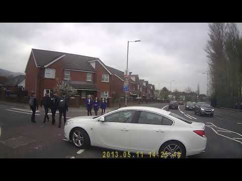 white car driver vs school kids