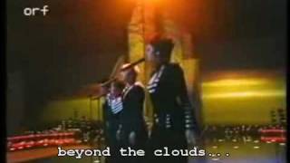 Eurovision 1994 Romania : Dan Bittman-Dincolo de nori - english translation