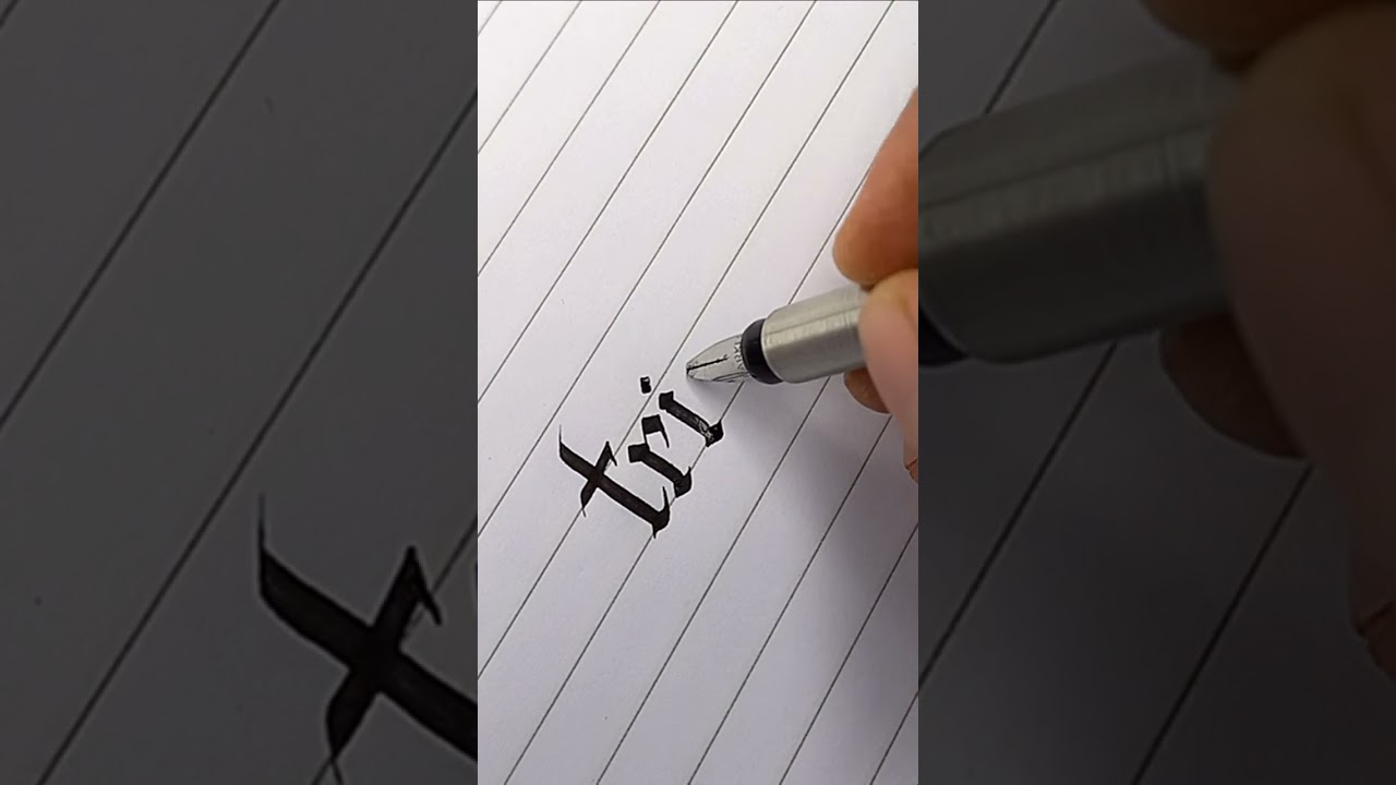'trip' gothic letter calligraphy.