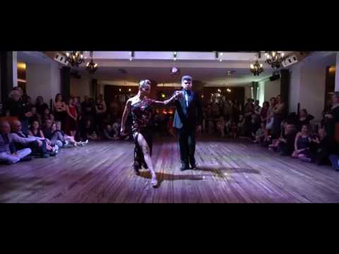  Alejandra Hobert  and  Adrian Veredice  are  dancing  to  the  tango  "  Oro Y Gris  "  at  Catania Tango Festival  in  2019